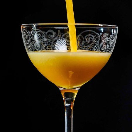 ホテル プルマン リガ オールド タウン エクステリア 写真 A glass of orange juice